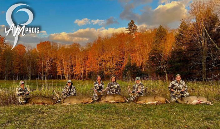 Prois hunters with their bucks