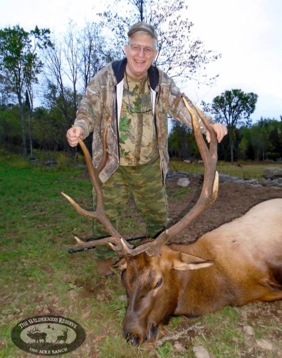 A hunter shows off his elk trophy 