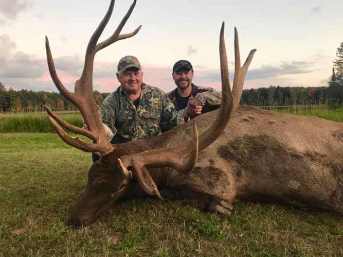 a pair with their very large elk harvest