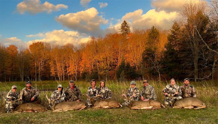 a group shows of several whitetails 