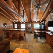 Whitetail cabin living area, kitchen and bar interior